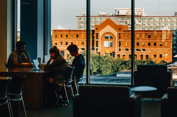 students studying on the 5th floor of the Library